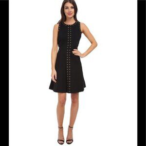 Fabulous black Michael Kors LBD black dress gold grommet detail Size 4